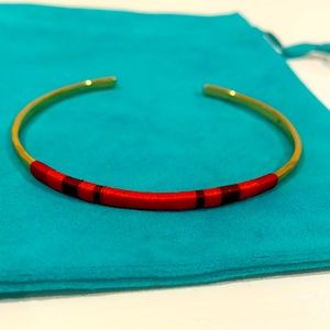 Delicate gold bangle with colorful fabric EUC